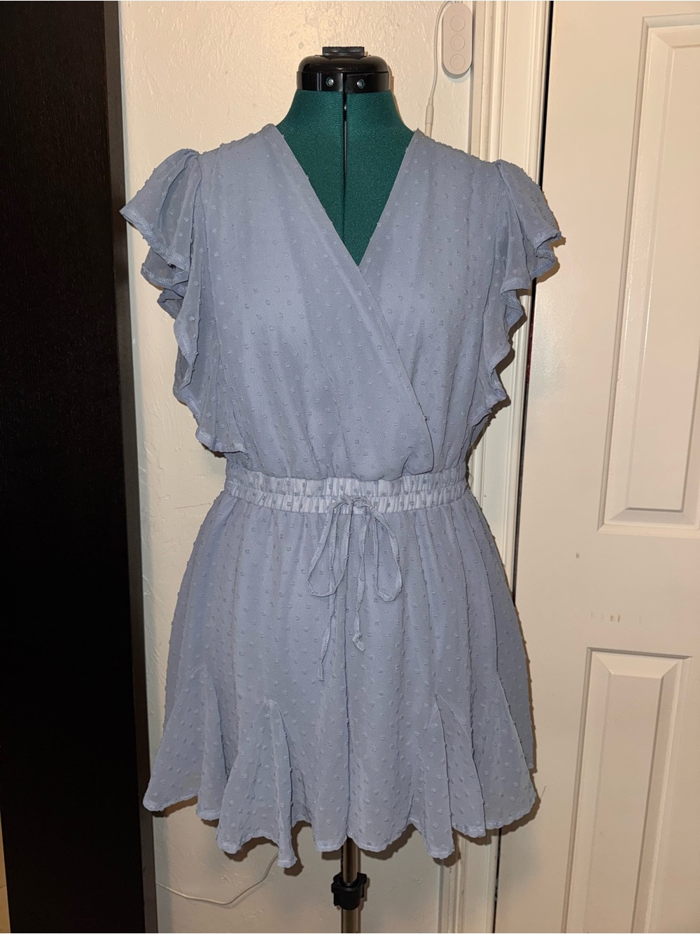 Light Blue Swiss Dot Wrap Style Romper with Ruffle Sleeves